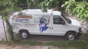 Picture of our plumbing service van taken from inside a customer's home. 